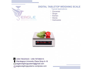 What is the price of a precision weighing scale in Kampala