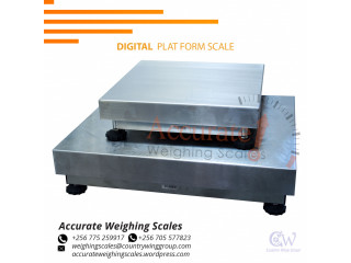 Digital platform weighing scale with a wide stainless-steel column and plate at supplier shop Kasese, Uganda