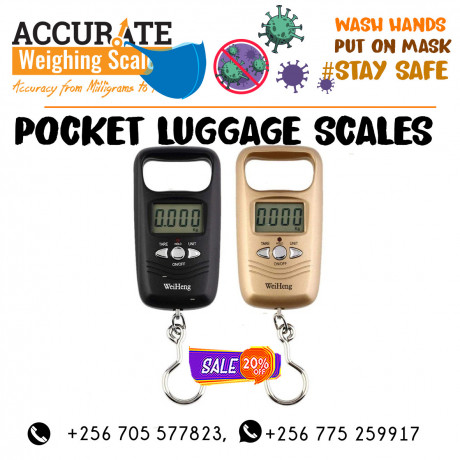 travel-luggage-suitcase-hanging-scales-mityana-uganda-big-0